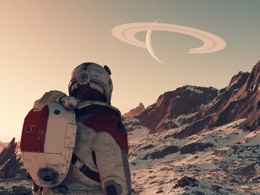 Starfield, player looking at a ringed planet with mountains infront of them